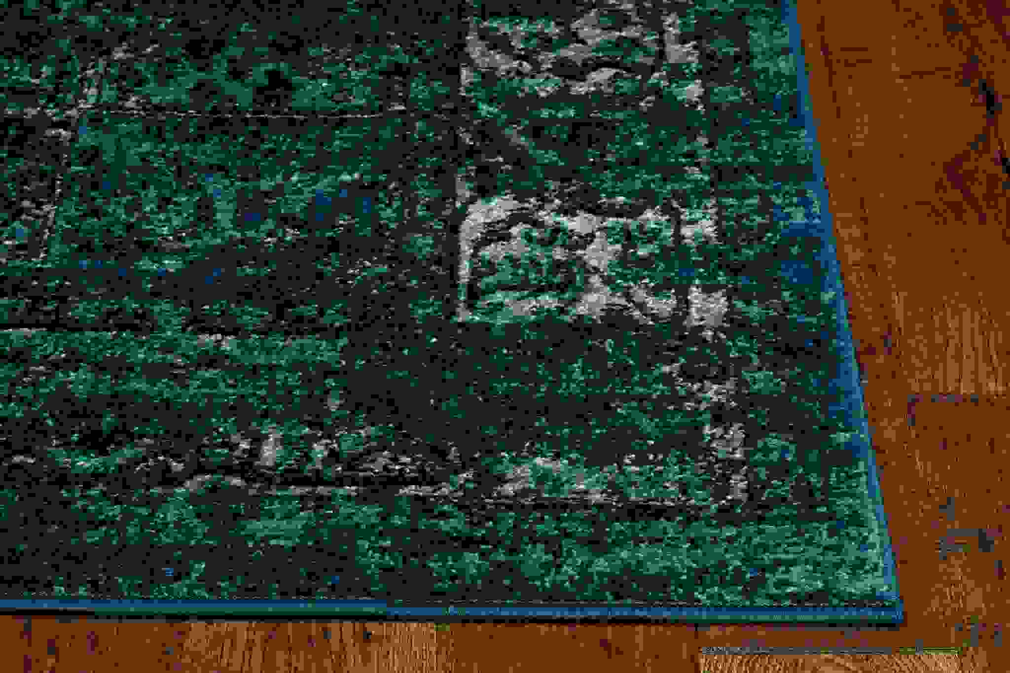 63" X 91" Teal Polypropylene Rug