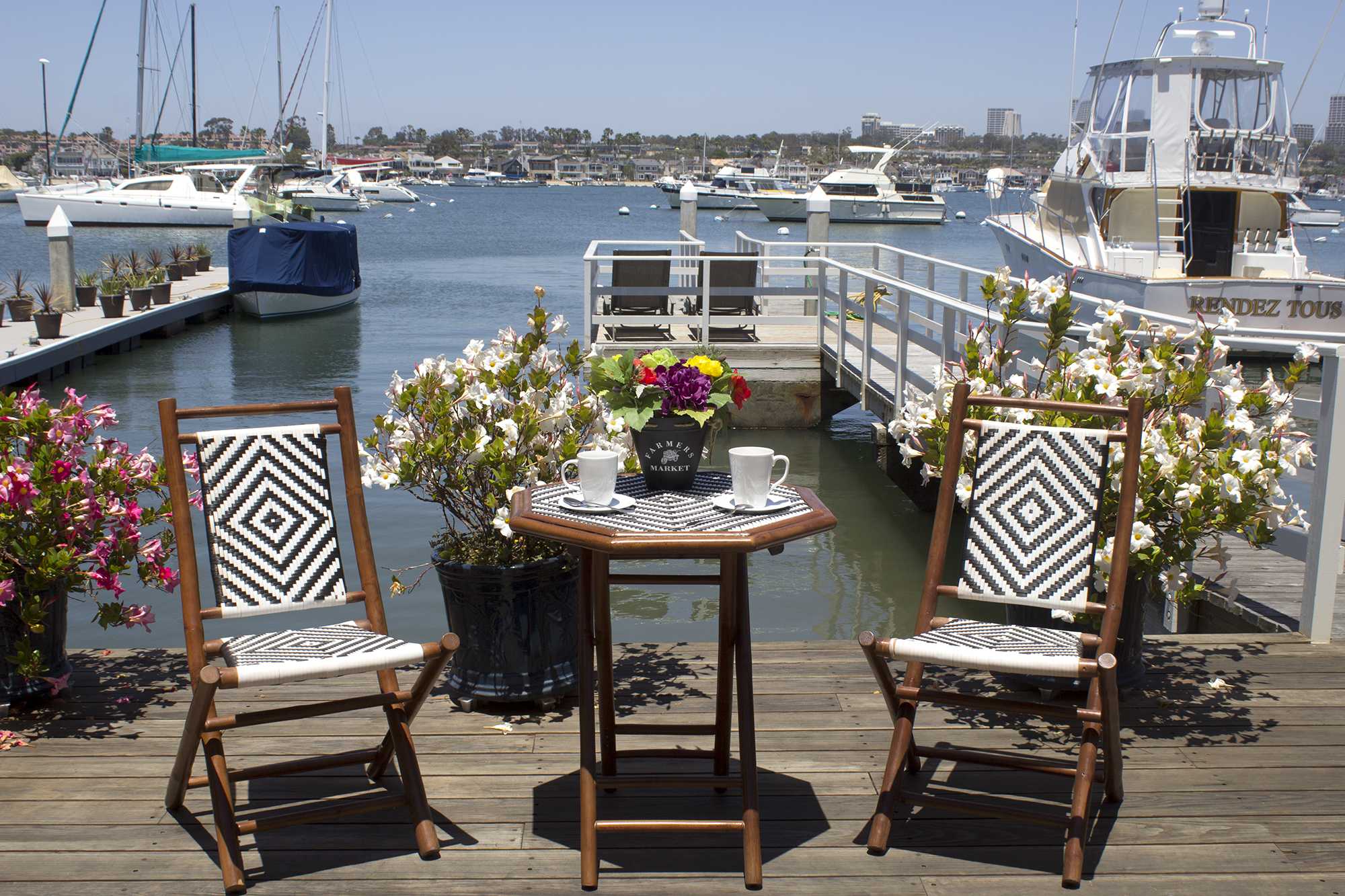 20" X 15" X 36" Brown Bamboo Black and White Poly-Rattan Bamboo Set of Chairs and a Table