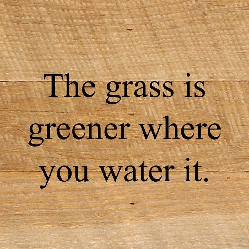 The grass is greener where you wate... Wall Sign