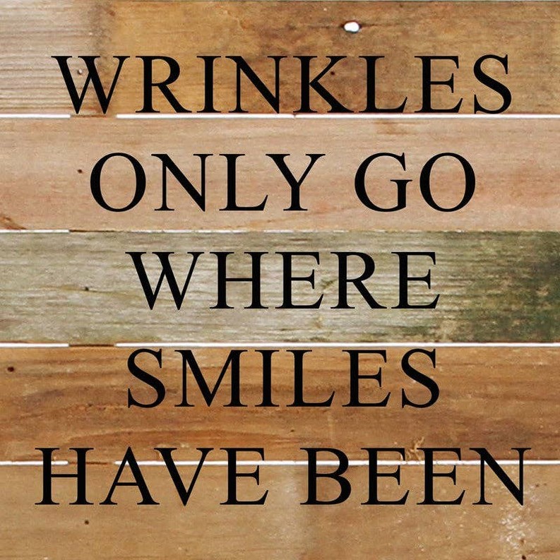 Wrinkles only go where smiles have... Wall Sign